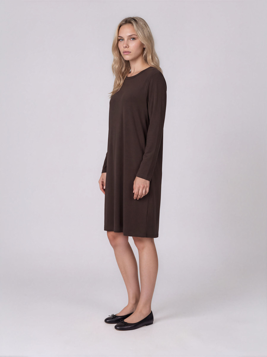 A-line dress with long sleeves and pockets.