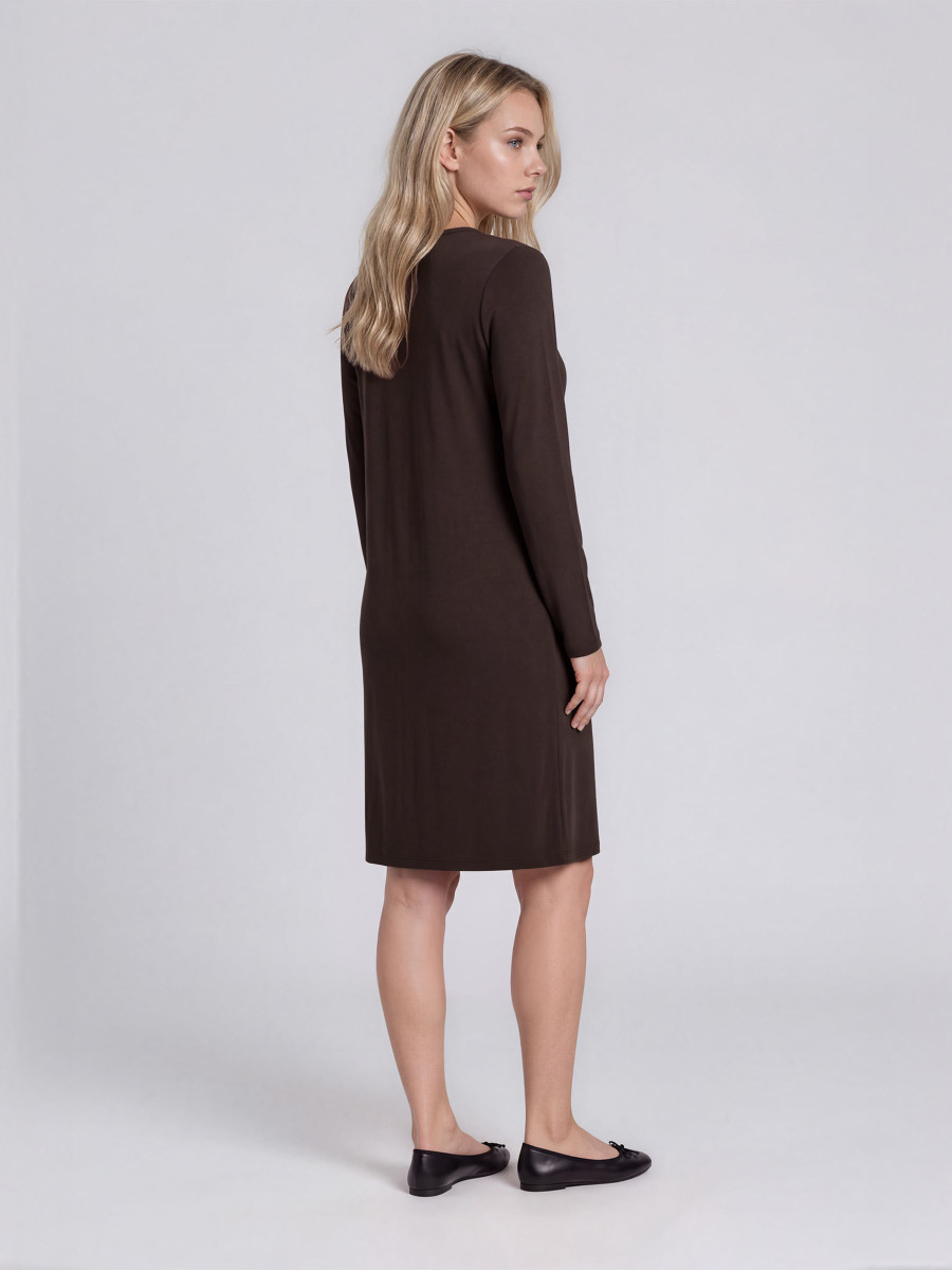 A-line dress with long sleeves and pockets.