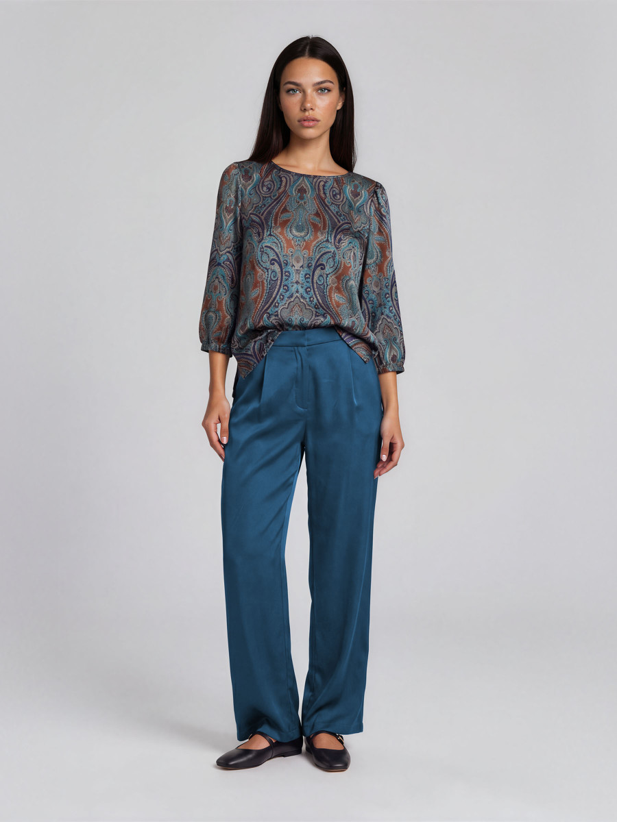 Wide-leg pants with an elasticated back waistband and a tailored flat front